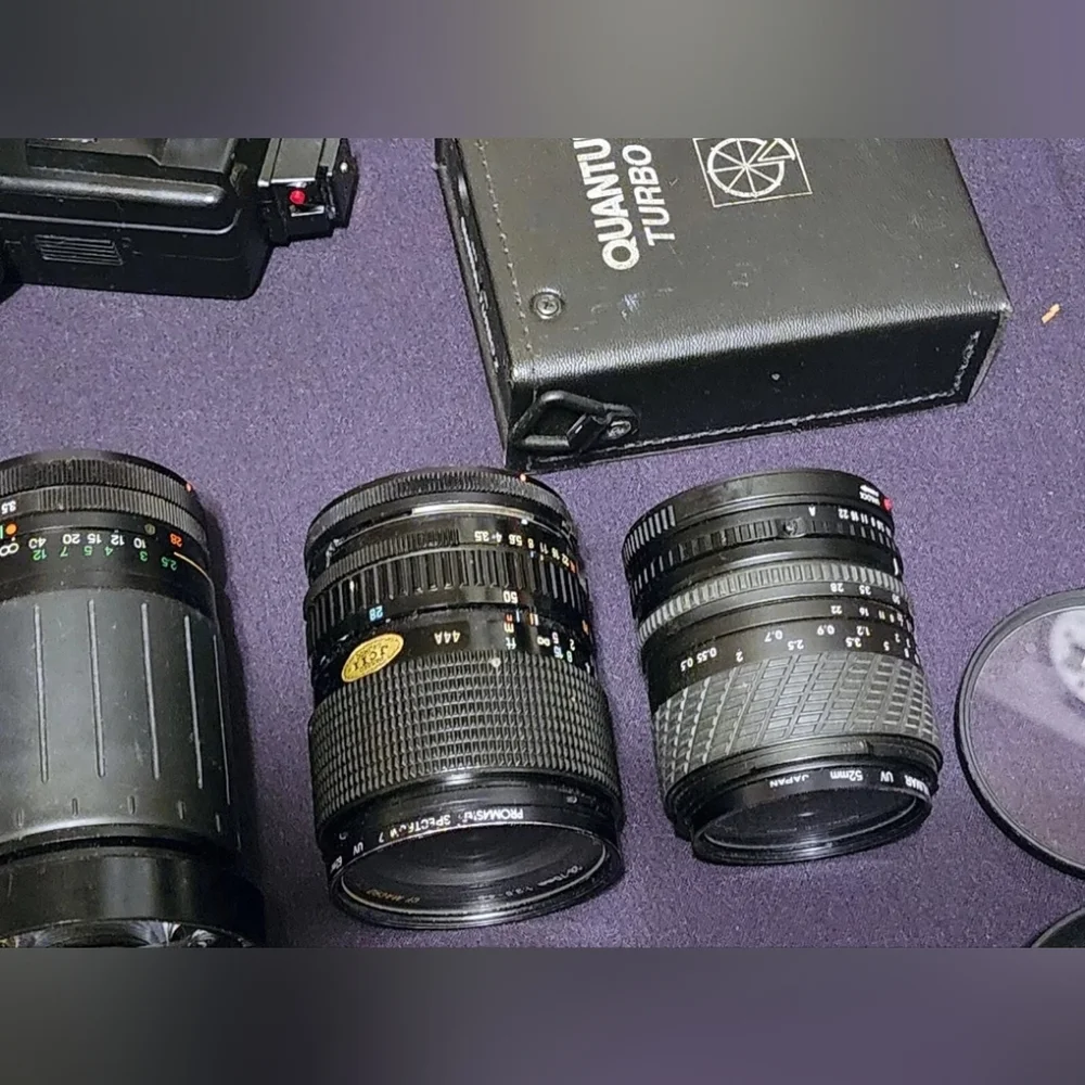 Two Canon cameras and lenses